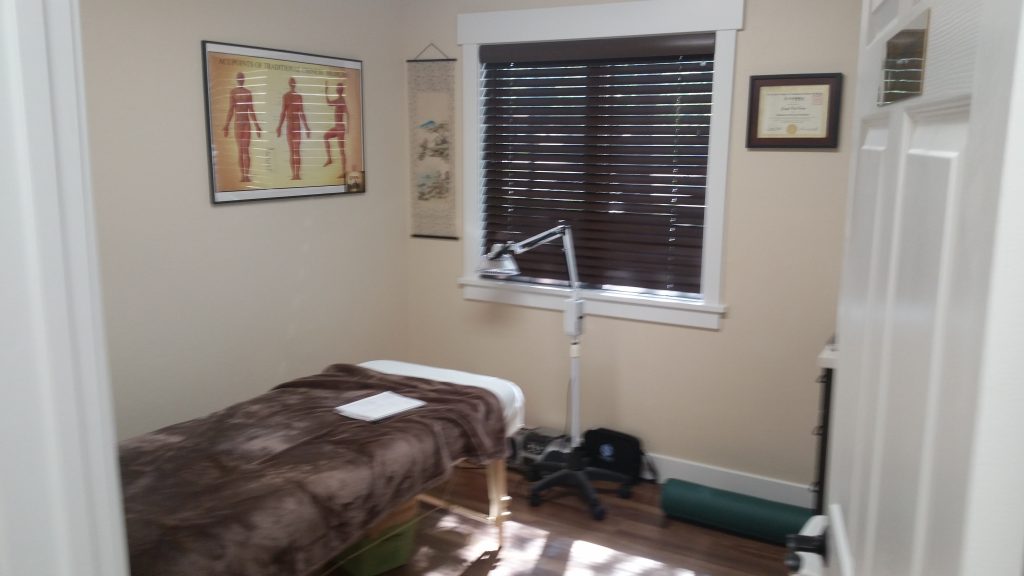 Image of treatment room at golden compass acupuncture